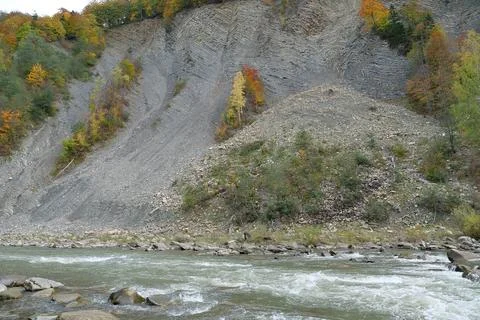 Beautiful mountain river with rapid current. Prut river and mountain folds Stock Photos