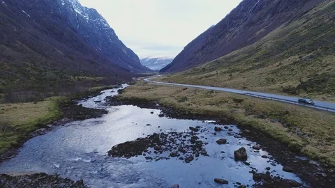 Beautiful mountain road next to river Stock Footage 78389956