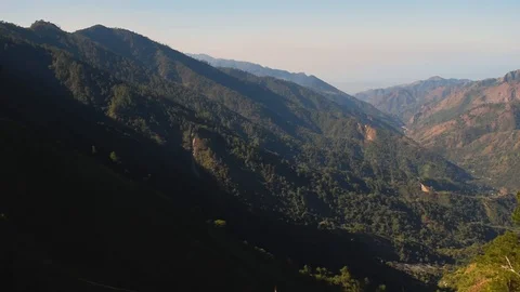Beautiful mountain scene with pine trees taken during the daytime Stock Footage 102246163