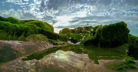 Beautiful mountain stream with dramatic clouds Stock Footage 62466845