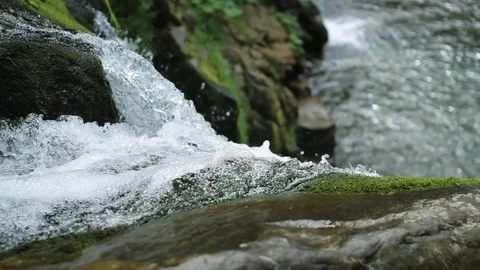 Beautiful mountain stream in the forest cascade fresh green landscape nature Stock Footage 99370963
