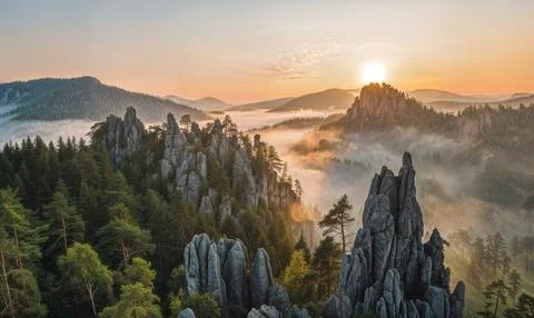 Beautiful mountain sunset view with pine and mixed forests and rocks Stock Photos