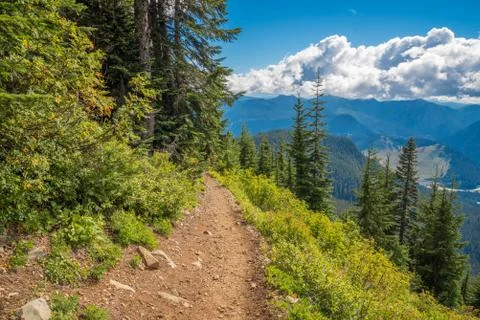 Beautiful mountain view with a cloudy sky on the background Stock Photos