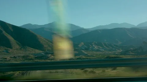 Beautiful mountain view from a moving car Stock Footage 79851241