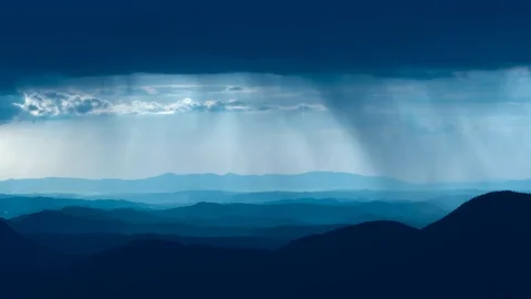 The beautiful mountain view on the rainy cloud stream background. time lapse Stock Footage 112776609