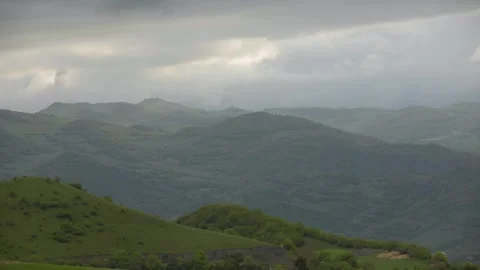 Beautiful mountains and cloudy sky Stock Footage 245706656
