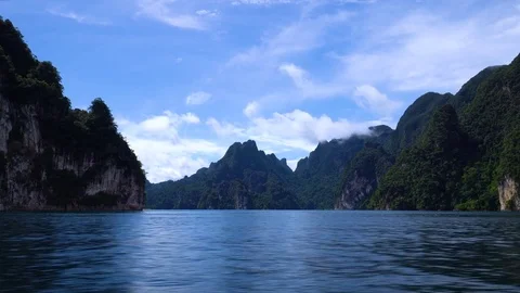 Beautiful mountains and sky with clouds on Cheow Lan lake. Stock Footage 82642920
