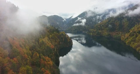 Beautiful mountains in the clouds. Aerial Stock Footage 117768072