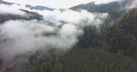 Beautiful mountains in the clouds. Aerial Stock Footage 117768204