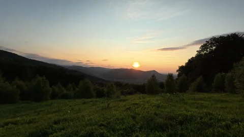 Beautiful mountains with warm sunset at spring or summer time Stock Footage 333561988
