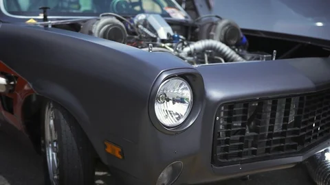Beautiful movement, a powerful engine in an rebuild drag race car. Stock Footage 108853974