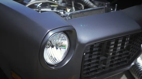 Beautiful movement, a powerful engine in an rebuild drag race car.	 Stock Footage 108854072