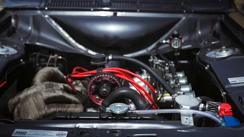 Beautiful movement, a powerful engine in an rebuild drag race car.	 Stock Footage 108854097