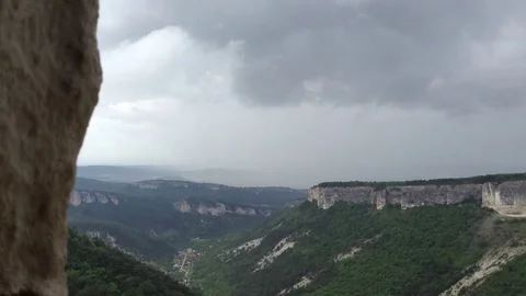 Beautiful moving clouds in mountain forest at Mangup Kale - Crimea , Russia Stock Footage 73765988