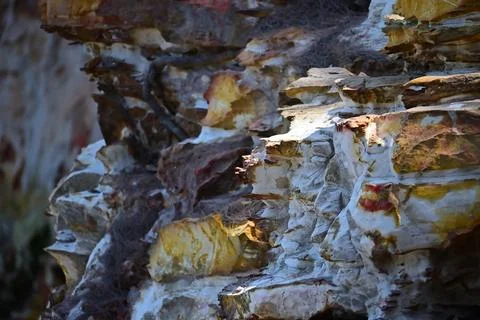 Beautiful Multi-Colored Beach Cliff Stock Photos