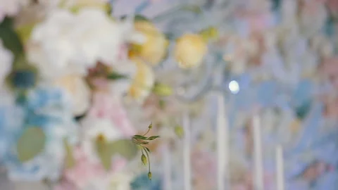 Beautiful multi-colored bouquet of flowers prepared for a wedding. Roses are Stock Footage 122917768