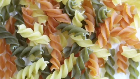 Beautiful multi colored dry pasta Vidéo 154414964