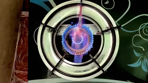 A beautiful multi-colored fire ignites and flares up Stock Footage 332063155