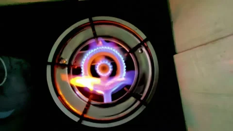 A beautiful multi-colored fire ignites and flares up with tongues of flame Stock Footage 332063255