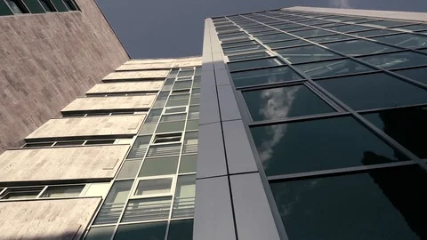 Beautiful multi-storey building with reflections Stock Footage 91586414