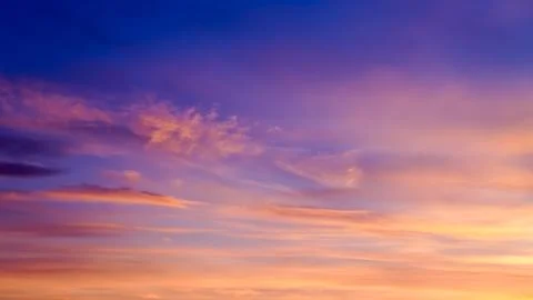 Beautiful multicolored clouds in the sky. Panoramic view of the sky. Stock Photos