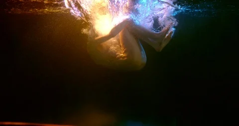 beautiful naked woman is falling on bott... | Stock Video