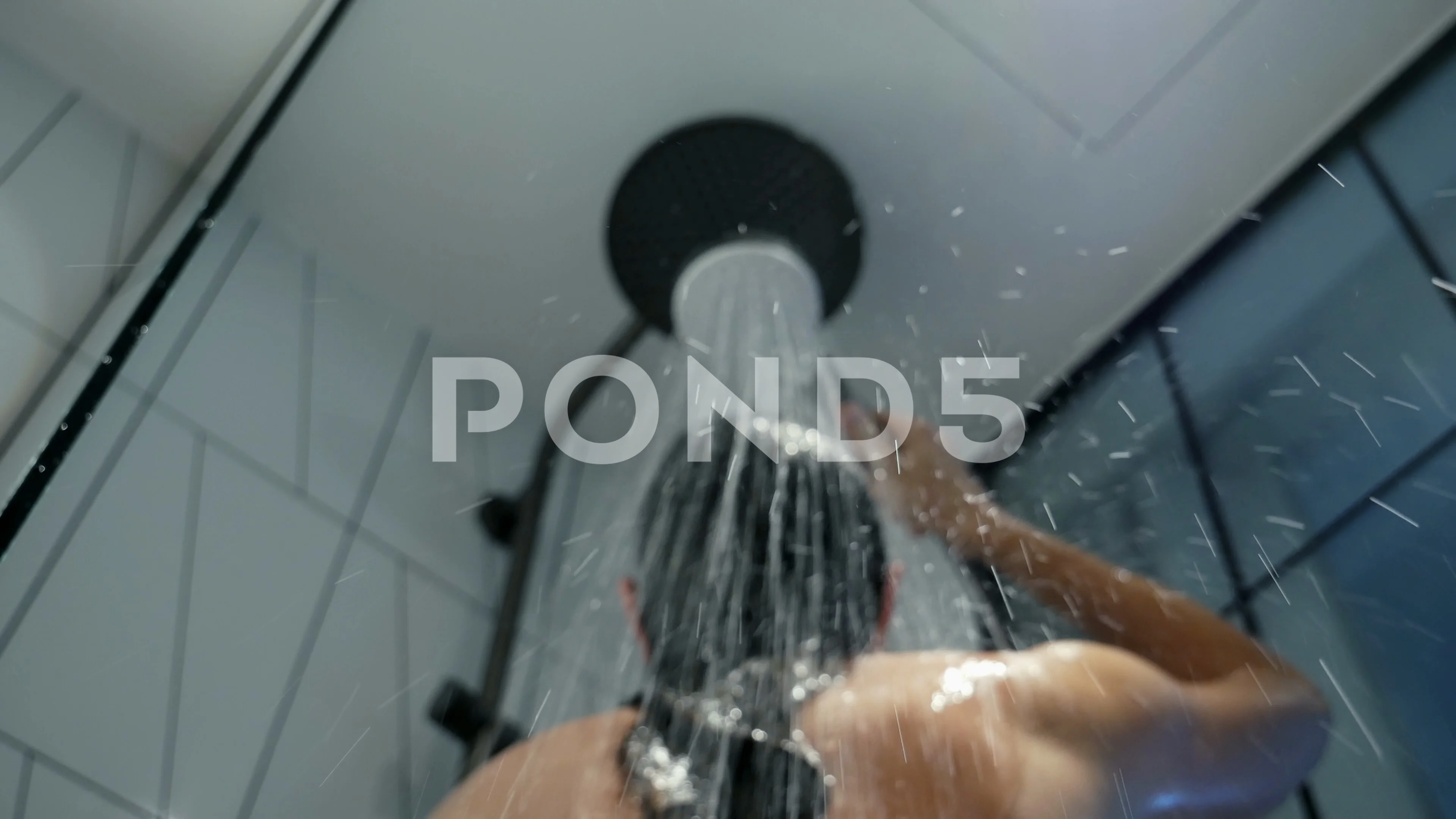 Beautiful naked woman taking a shower, sexy girl from the back enjoying washes