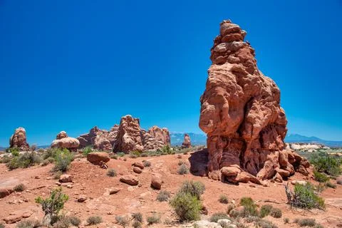 Beautiful natural rock formations in Arches National Park under a blue summer Stock Photos