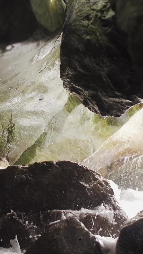 Beautiful nature. Reverse. Waves and rocks. Vertical format. Stock Footage 321291982