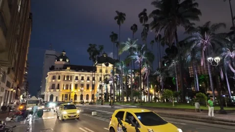 Beautiful neoclassical Edificio Otero lit up at night in historic Plaza de Stock Footage 336303254
