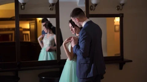 Beautiful newlywed couple posing in the chic expensive indoor. Stock Footage 102723911