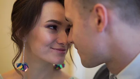 Beautiful newlywed couple posing in the chic expensive indoor. Stock Footage 102726396