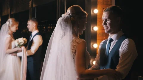 Beautiful newlywed couple posing in the chic expensive indoor. Stock Footage 139624948