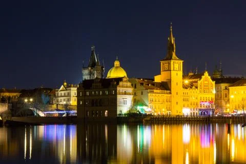 Beautiful night view of the Charles Bridge, the Old Town Bridge Tower, and th Stock Photos