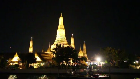 Beautiful night view of Temple of Dawn Wat Arun Bangkok Thailand Stock Footage 130893022