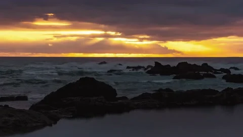 Beautiful Ocean Sunset with Light Rays Piercing the Clouds Timelapse Stock Footage 201030264