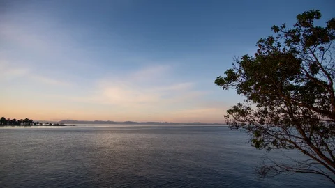 Beautiful ocean view day to night time lapse with sunset and star trails Stock Footage