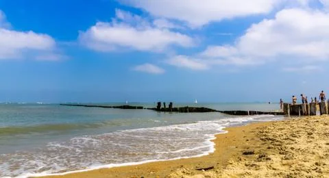 Beautiful ocean view with wave breakers on the beach of Breskens, Zeeland, Th Stock Photos