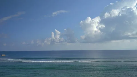 Beautiful ocean view with white clouds shot from high ground Video stock 111361432
