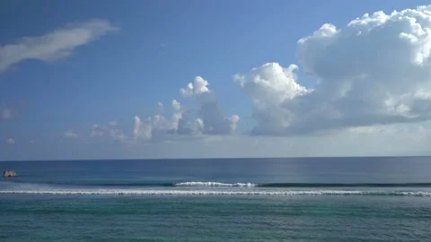 Beautiful ocean view with white clouds shot from high ground Video stock 111361539