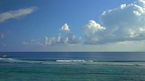 Beautiful ocean view with white clouds shot from high ground Video stock 111361915