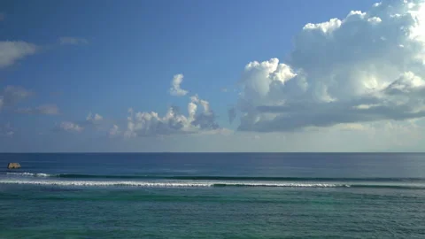 Beautiful ocean view with white clouds shot from high ground Video stock 111361970