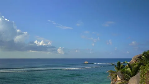 Beautiful ocean view with white clouds shot from high ground Video stock 111362558