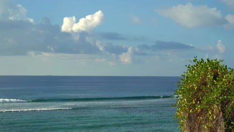 Beautiful ocean view with white clouds shot from high ground Video stock 111362732