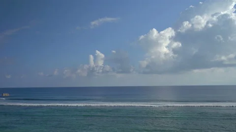 Beautiful ocean view with white clouds shot from high ground Video stock 111362962