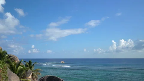 Beautiful ocean view with white clouds shot from high ground 스톡 동영상 111363275