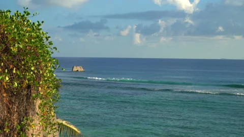 Beautiful ocean view with white clouds shot from high ground Video stock 111363451
