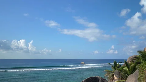 Beautiful ocean view with white clouds shot from high ground Video stock 111363506