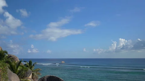 Beautiful ocean view with white clouds shot from high ground Video stock 111363602