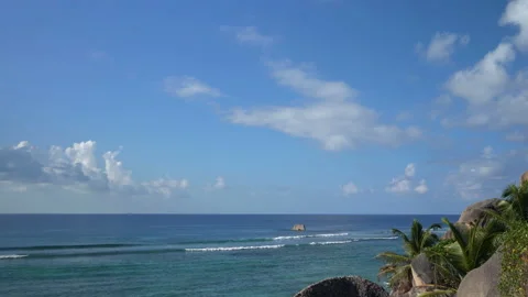 Beautiful ocean view with white clouds shot from high ground Video stock 111363683